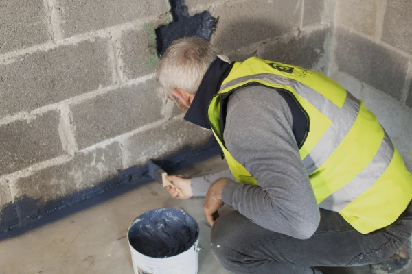 Aerosana Visconn Fibre being painted over a wall-to-floor junction.