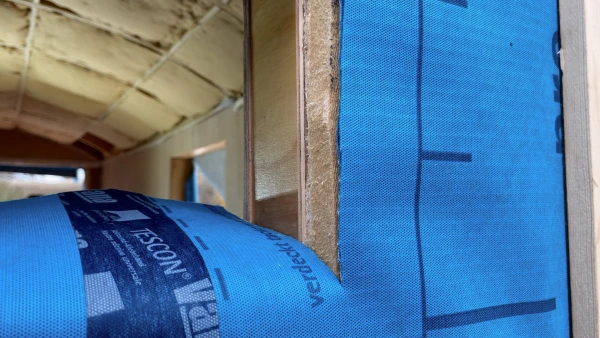 Gutex Multiplex Top board, covered with a Pro Clima Solitex Plus airtight membrane (before taping).