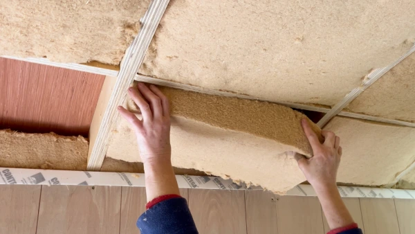 Plywood roof layer and 100mm Gutex Thermoflex insulation.