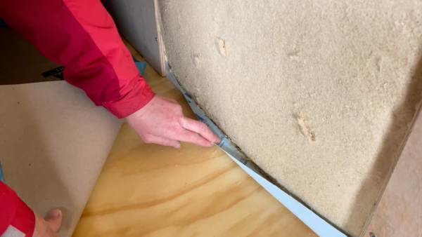 Pro Clima Tescon Profil tape to seal the junctions in the plywood floor.