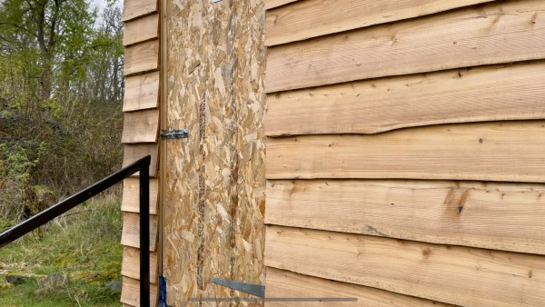 Temporary door – to be replaced with a half-glazed model.