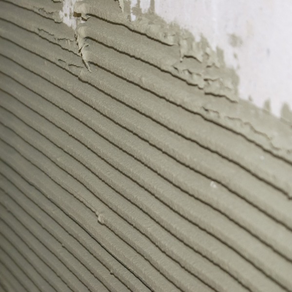 Calsitherm Adhesive applied with serrated trowel
