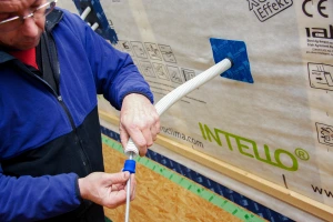 Inserting cable through Pro Clima Stoppa