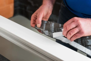 Removing the narrow adhesive strip