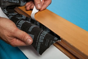 Removing the narrow adhesive strip
