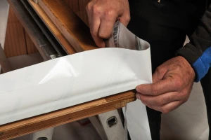 Airtight sealing tape for pre-application to window or door frames before they are fitted to the building