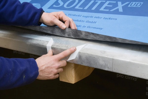 Duplex applied to a concrete slab with solitex membrane showing