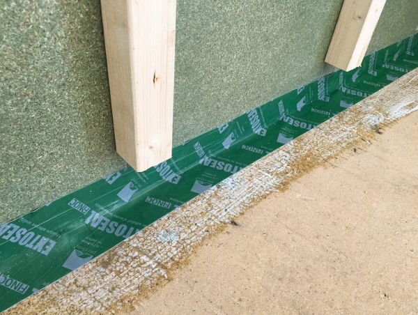 Masonry floor primed with Tescon RP Primer prior to applying Extoseal Finoc tape to ensure a permanent watertight seal