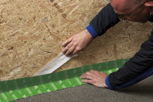 Extoseal Finoc being used to form a permanent watertight seal at junction of timber wall and masonry floor