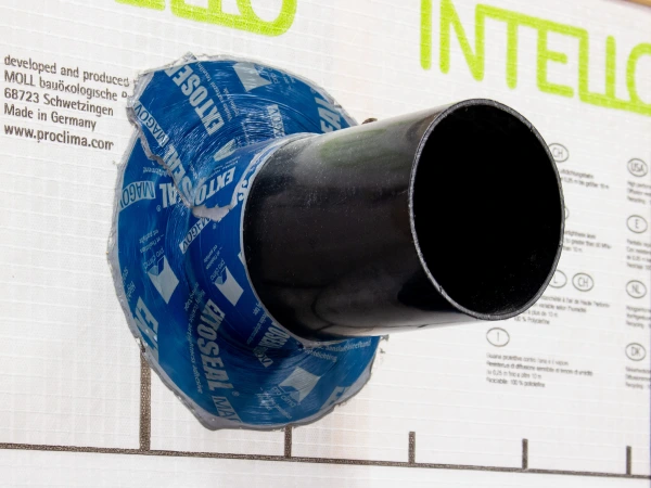 Extoseal Magov bonded to a pipe penetrating an airtight membrane