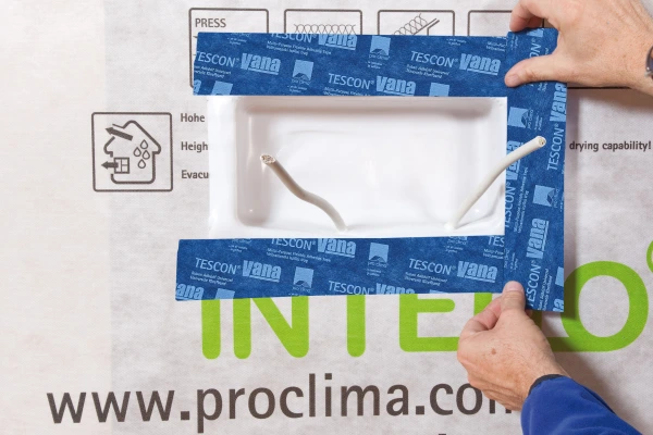Sealing around Instaabox with Tescon Vana airtight tape