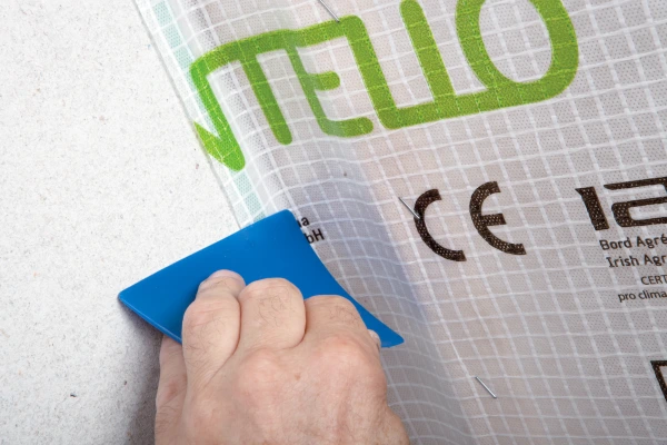 Using Pressfix Tool to seal Intello Plus to wall with Orcon Multibond