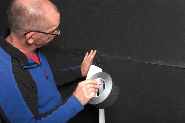 Tescon Invis black airtight tape sealing overlaps