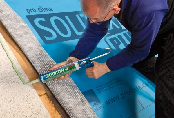 Seal Solitex Plus to masonry surfaces with Tescon Primer RP or Sprimer, then Orcon F airtight sealant