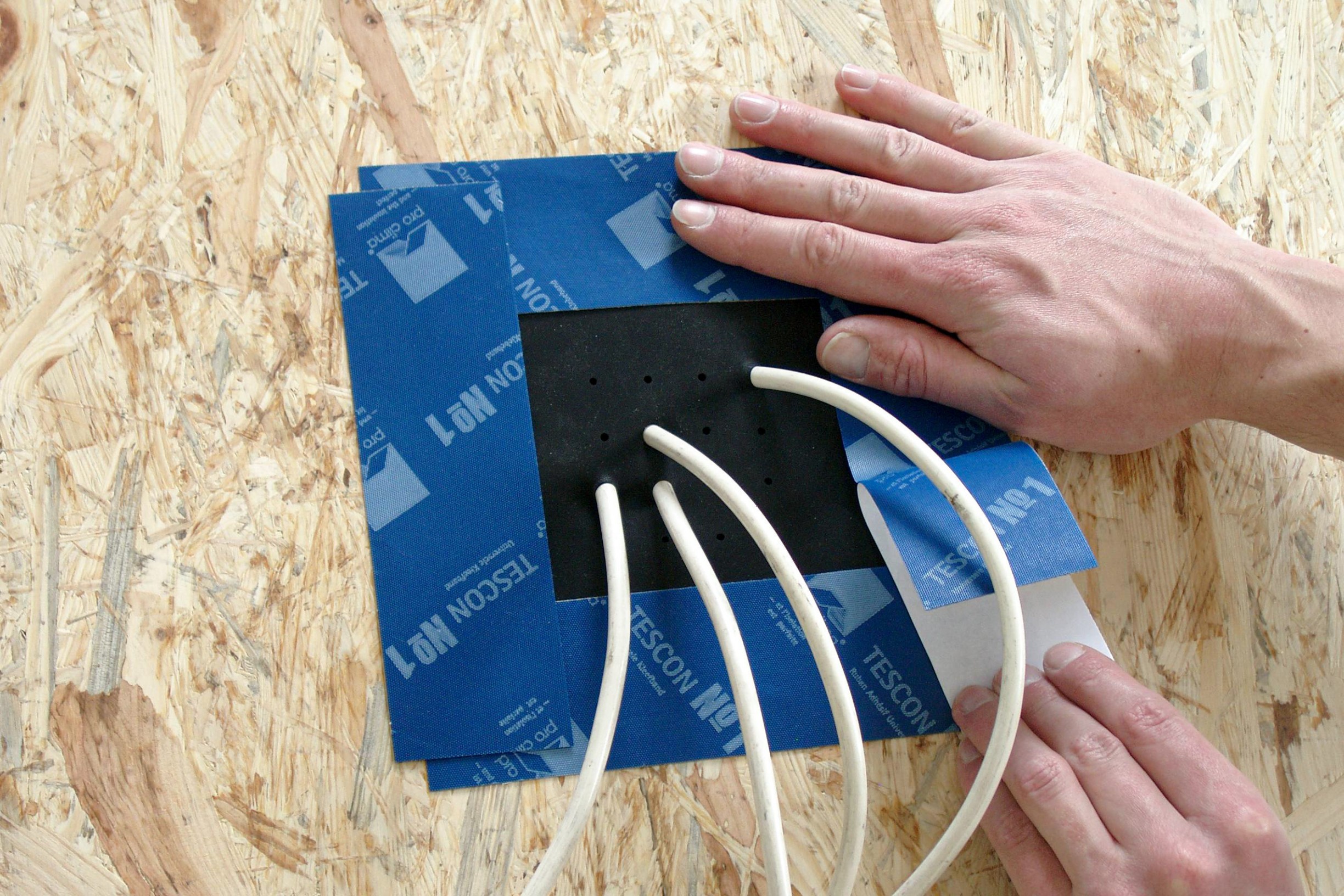 Sealing around Pro Clima Kaflex cable grommets with Tescon No.1