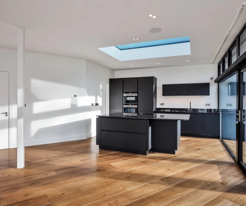 Kitchen with island and skylight