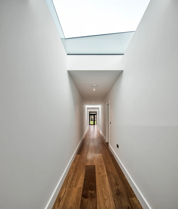 Long corridor spanning the length of Passive House