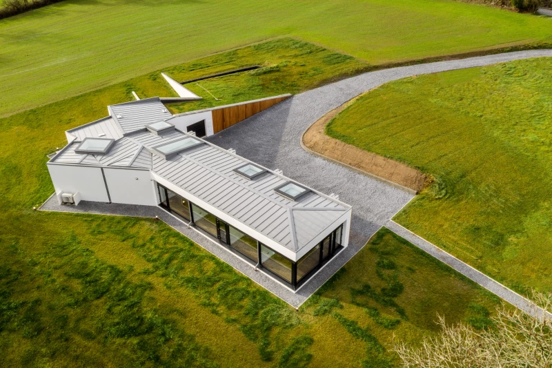 Aerial shot of Passive House built into slope