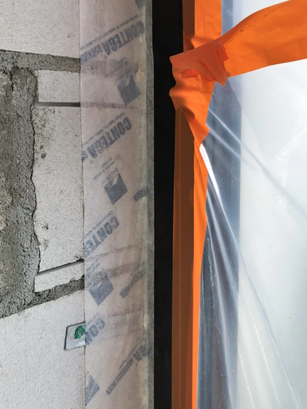 Contega Solido airtight tape on Passive House window detail