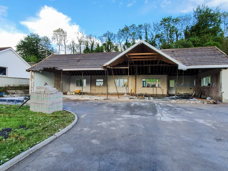 To minimise embodied carbon, the rear wall, gable ends, foundations, and floor were retained.