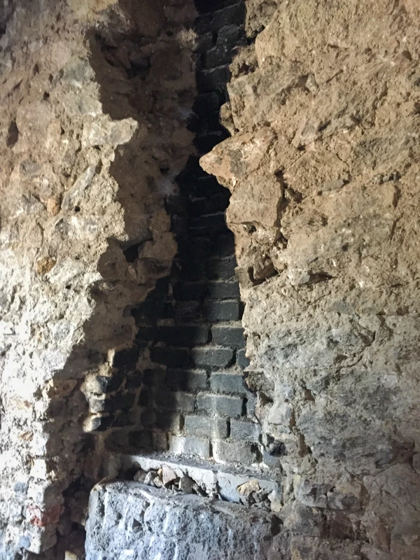Internal granite wall before gap was infilled with bricks