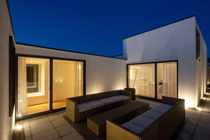 Outdoor seating area in renovated cottage