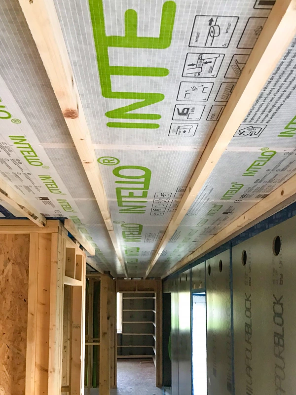 Intello plus airtight membrane on a ceiling in a hallway