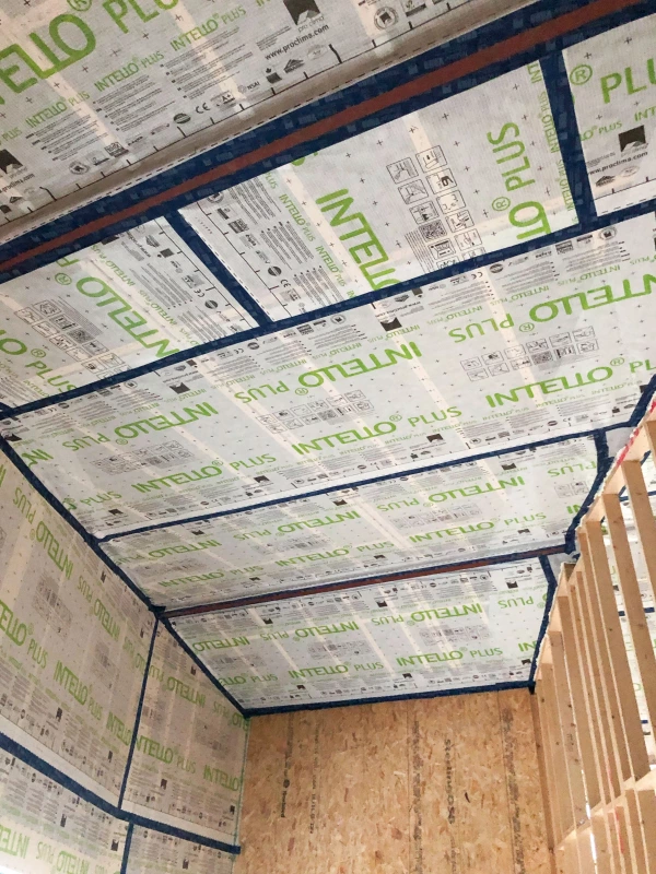 1.5 metre wide lengths of Intello Plus membrane on a ceiling