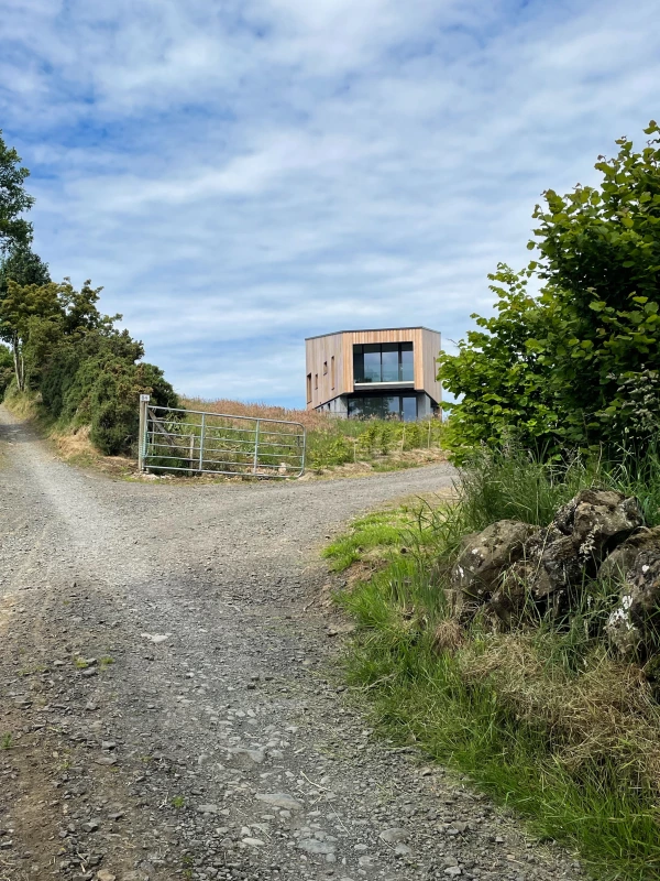 Knockboy barn passive house as viewed from the road