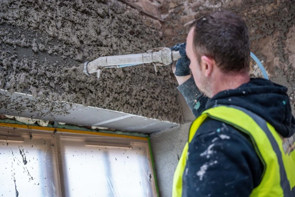 Diathonite Thermactive being spray applied over a window head