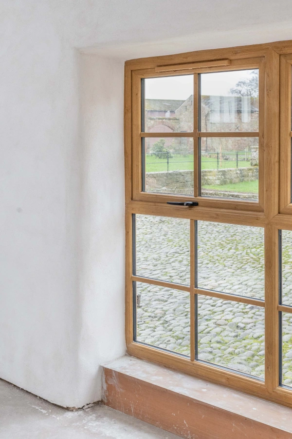 Cured Diasen Argatherm finishing plaster around a window