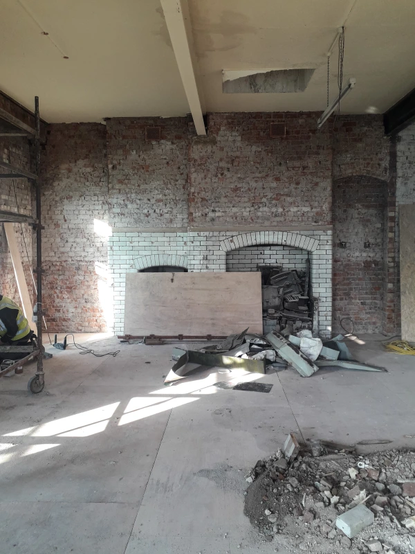 Wall before Calsitherm is applied and before glass panels and door are installed