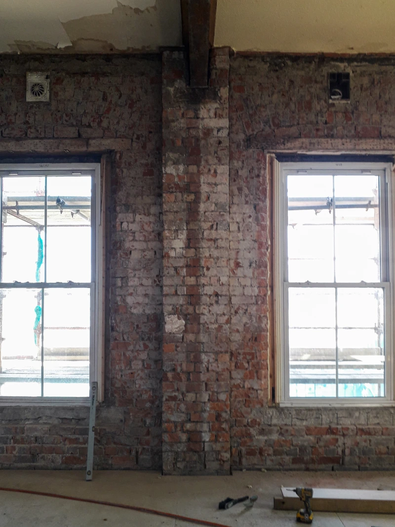Exposed brickwork around windows