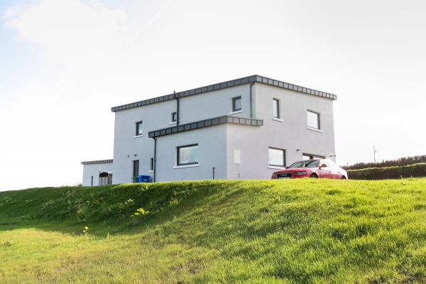 Passive House in Castlebar Co. Mayo viewed from the bottom of a hill